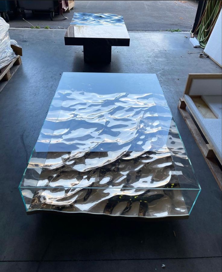 designdocument's tweet image. Liquid Chrome Wavy Coffee Table 🌊🩶
