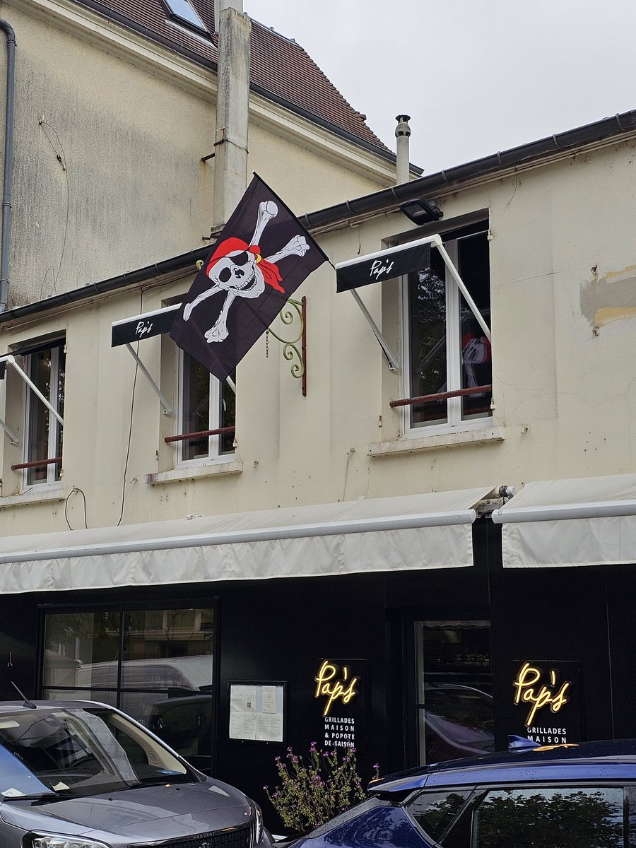 Staying in a smallish village on the outskirts of Paris. Saw this flag outside a restaurant and had to stop for lunch. A couple of guys looked like ex-rugby players came in and ordered the 1.2Kg steak but they mustn't have been forwards as they wanted it cooked. <a href="/Peter_Fitz/">Peter FitzSimons</a>