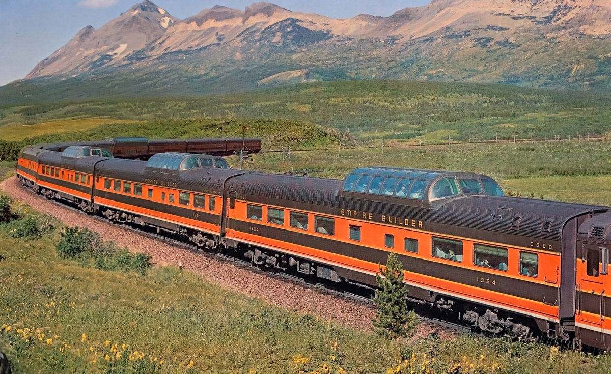 Great Northern's Empire Builder - complete with Vista Domes and a full dome - traverses the state of Montana in 1955.

Photo by the Great Northern Railway.