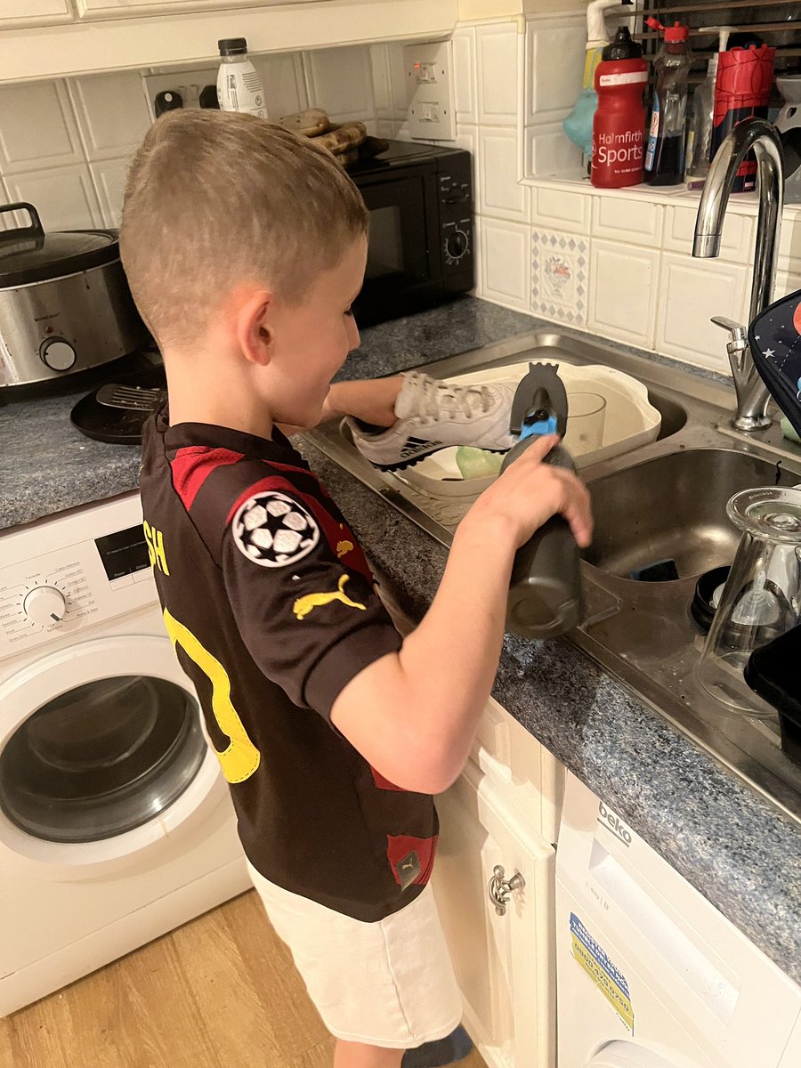 TashaWoolly's tweet photo. After his first game for @YorkCityFC against West Brom the boyo is scrubbing his boots ready for his 2nd game tomorrow against Peterborough United 💙 you got this ols ⚽️ https://t.co/UBRrutCrt4