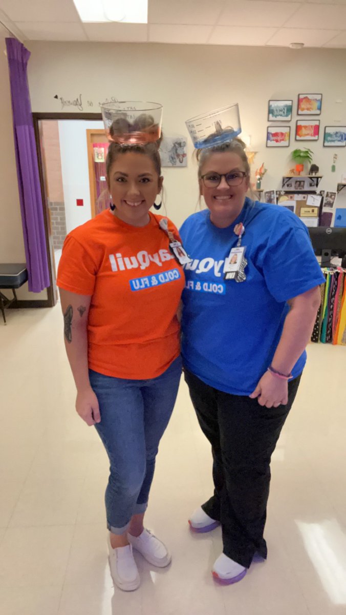 Nurse_CandiH's tweet photo. AIS Nurse, Candi, and clinic assistant, Ms. Brooke are "day" and "night" as we think of the change in weather coming up! Take care of yourselves! #dayquil #nyquil #alvaradoexcellence https://t.co/28wqZ0JlSr
