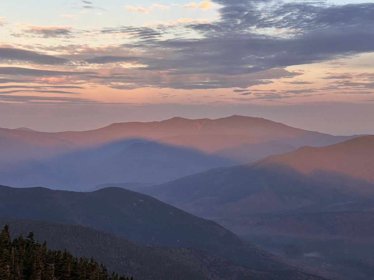 Mt Carrigain sunrise hike for the NH 48 finish! Caught the shadow of the mountain!