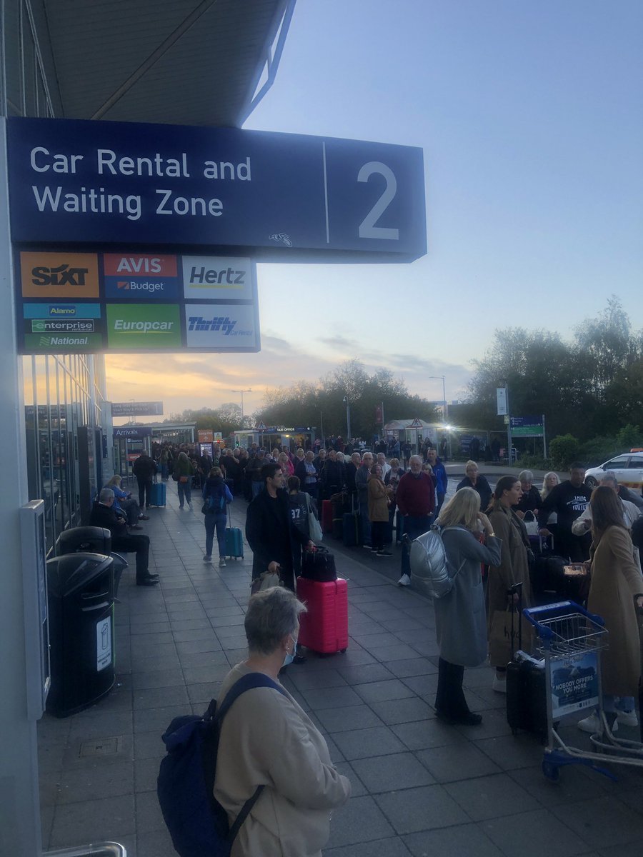 DrRhideWreede's tweet photo. @BristolAirport Buses to the #silverzone are sparse and the queue is long, really really long. Step up! https://t.co/XUIkhcVPMs