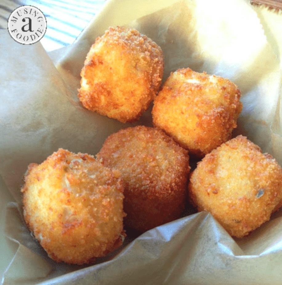 "Think about all the creamy gooey-ness on the inside of a chicken pot pie, rolled up and coated with a light breadcrumb and then flash-fried just enough to get the filling hot on the inside, and the coating crispy on the outside.

They are AH-MAY-zing."  — @amusingfoodie