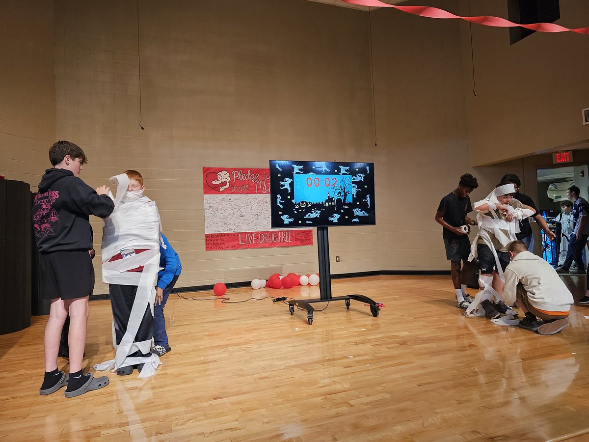 And that's a WRAP on #CSMSRRW ❤️ Base Camps competed against each other in a Minute to Win It mummy wrapping contest 👻⚰️🧟‍♂️  #RedRibbonWeek2023 <a href="/CSMS_Huskies/">Carolina Springs Middle School</a>