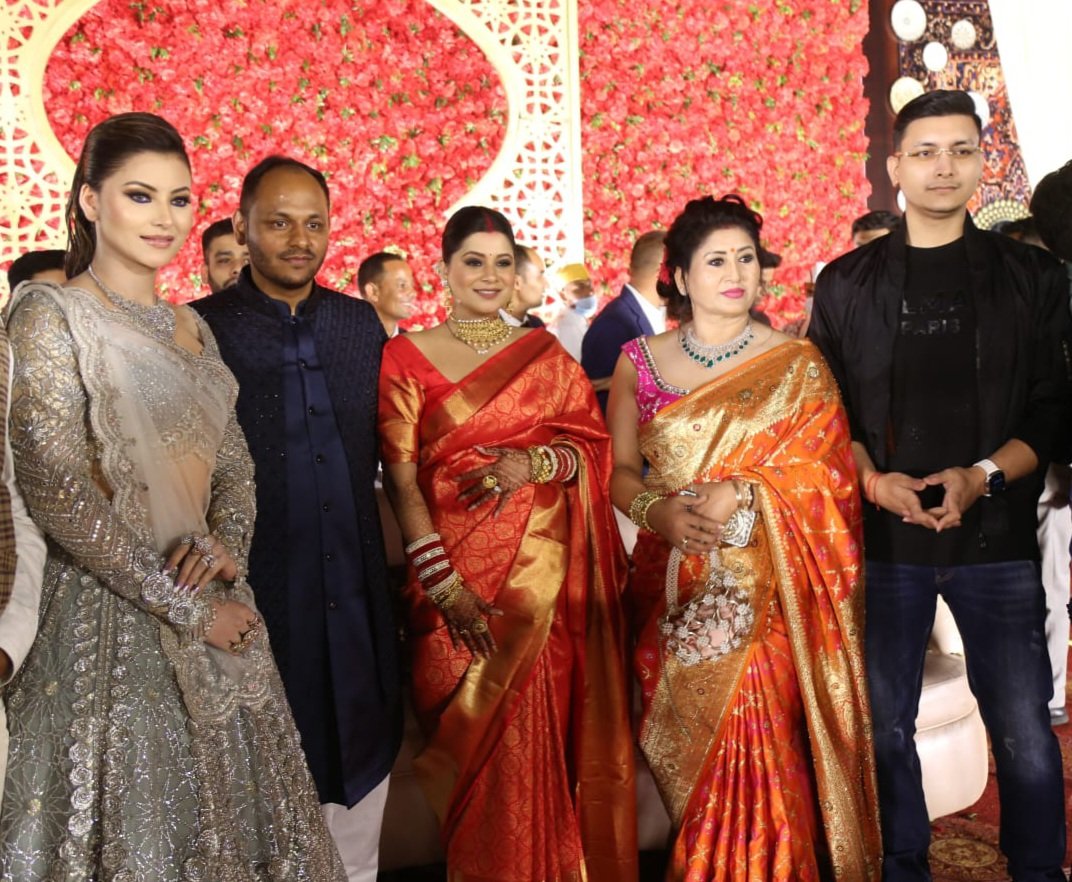 GarhwalPost1's tweet photo. The wedding reception of Deep, son of Prema &amp; Nandan Singh Koshyari with Ayushi, daughter of Seema &amp; Rajendra Rao was held in Doon on 27th Oct. Deep is nephew of @BSKoshyari! The #GarhwalPost family wishes the newly weds a happy married life!
#Uttarakhand #UrvashiRautela https://t.co/nCRhvMTD2n