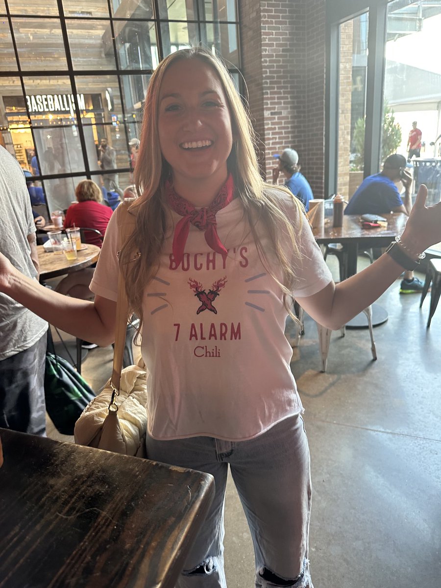 gordonkeith's tweet image. This woman is stealing ALL P1 hearts with her own custom T-shirt. Genius. Go Rangers. Photo by ⁦@hueywyatt⁩