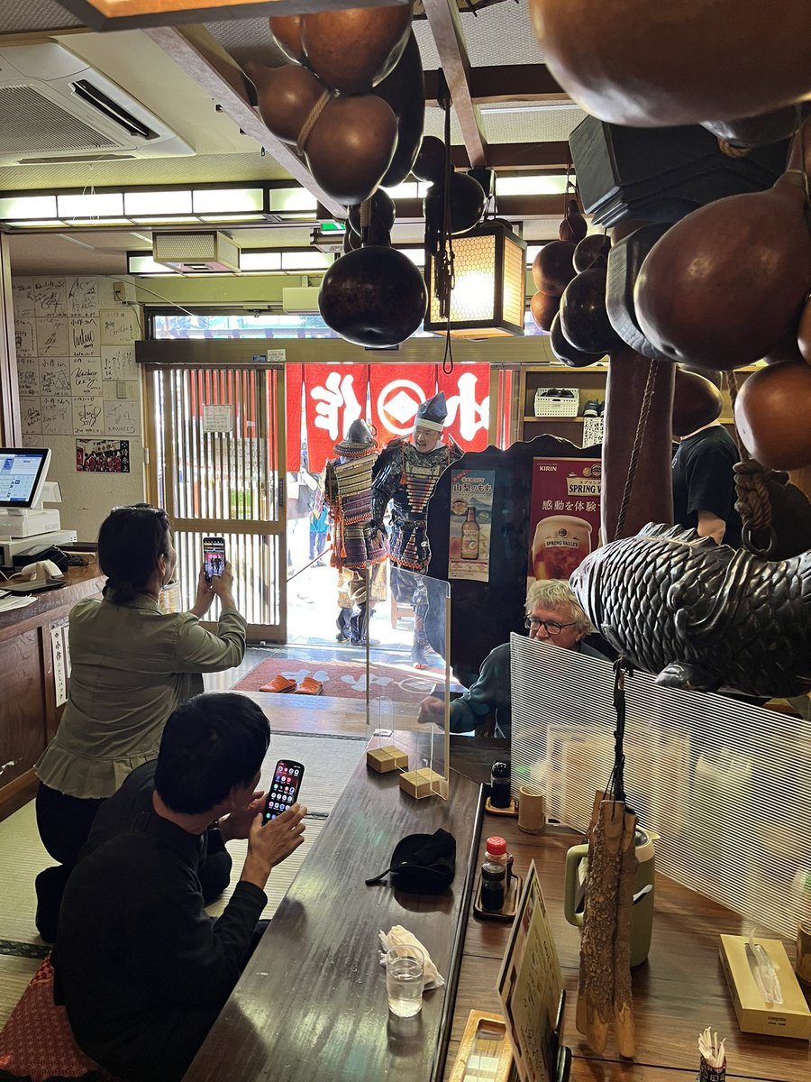 multiple boys balloon indoors hat shop holding phone  illustration images