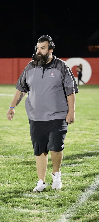 WellingtonActiv's tweet photo. Coach Meeks can do it all! Coach the game and cheer on the team in the student section! https://t.co/L5YKOAE6hD