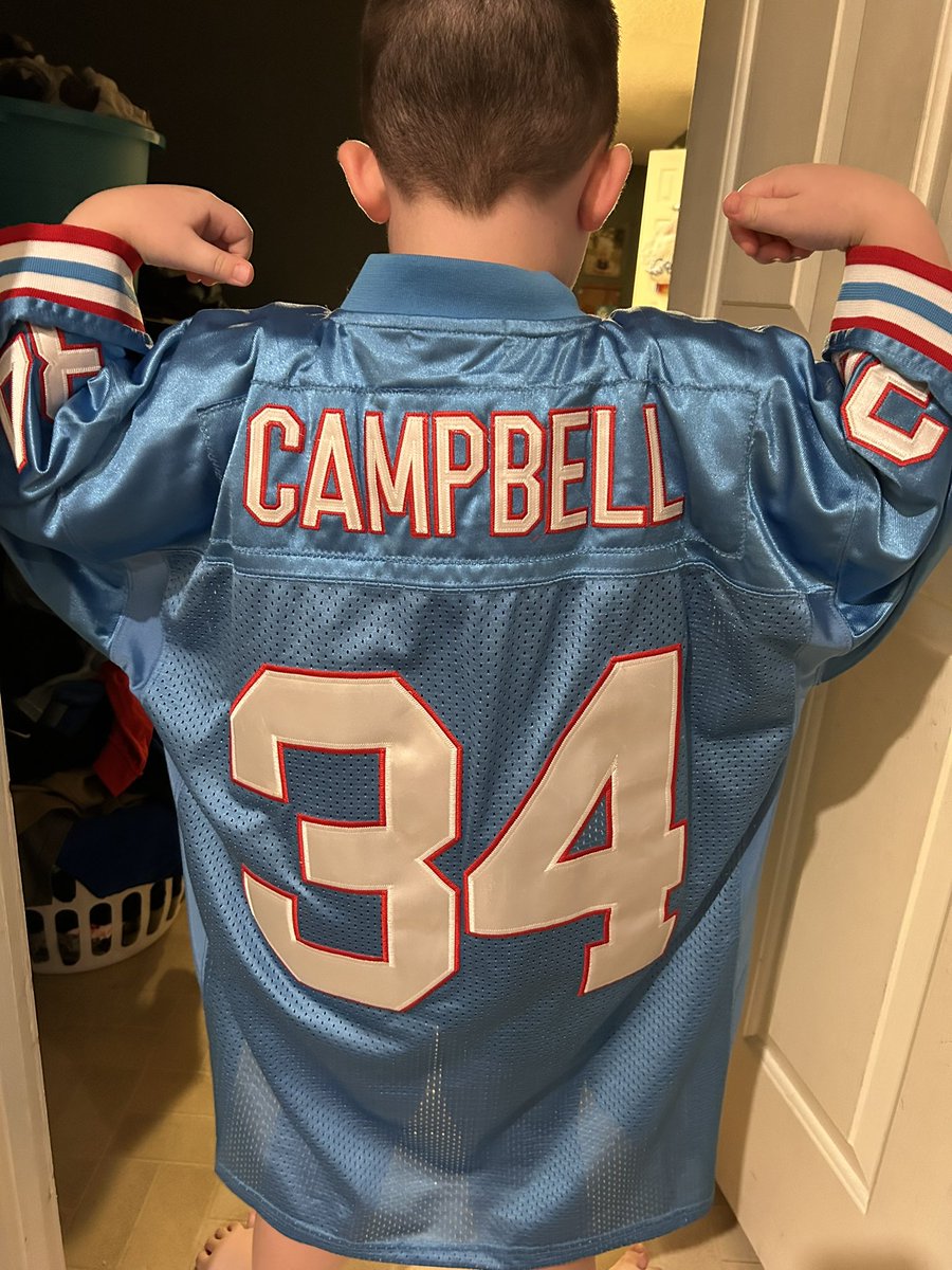 HankStewart11's tweet photo. @Titans my big boy is attending his second ever game Sunday, and another 🐐 RB throwback jersey is a little too big. His favorite player is @KingHenry_2 so we are gonna have to go with his new hoodie. Dad will be rocking the legend number 74 Bruce!! #gotitansgo https://t.co/P8snzTH16B