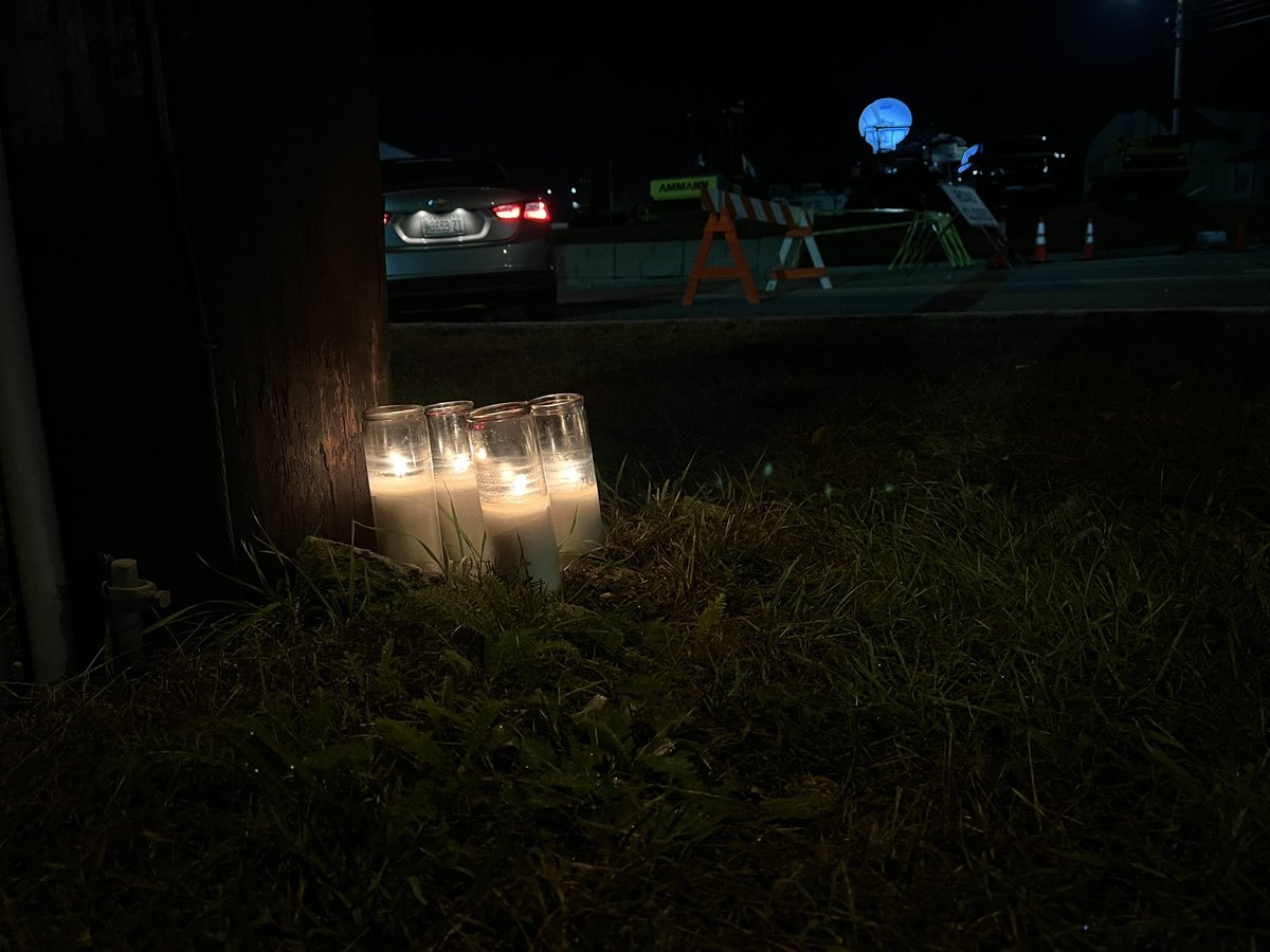 StackhouseNCME's tweet image. Four candles are lit next to the road closure on Lincoln Street in Lewiston, a short walk from Schemengee’s Bar &amp;amp; Grill, one of two locations attacked in this week’s deadly mass shooting. The suspect’s body has been found, and Lewiston can begin to heal @newscentermaine