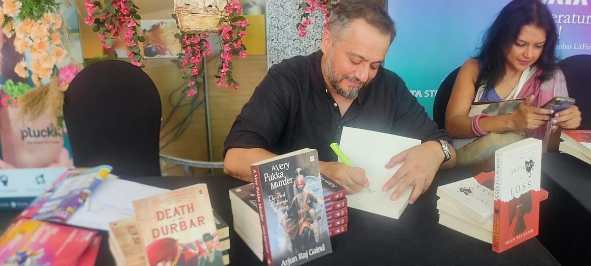 HarperCollinsIN's tweet photo. Author #ArjunRajGaind signs copies of #AVeryPakkaMurder and chairs session WHERE THE LIGHT GETS IN;
Stories of loss, pain, and redemption at @tatalitlive 

In conversation with @BriohnyDoyle, #GavinMcCrea and #IffatNawaz

#TataLitLive2023 #TLLPowerOfWords #TataLitLive https://t.co/acrFyEWGvP