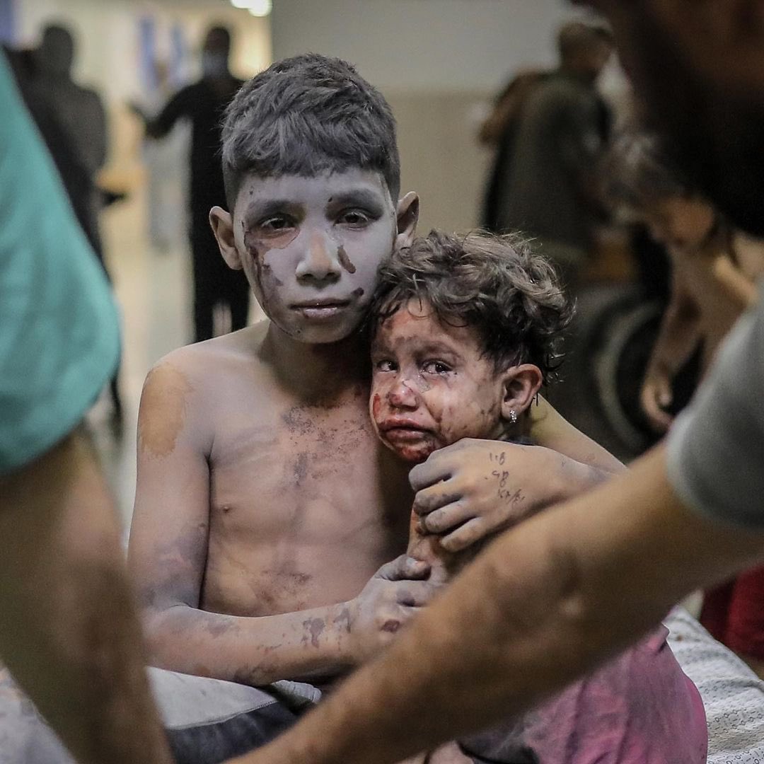 hamasbacha's tweet photo. Hugging his sister… #Gaza
#FreePalestine 
#WeStandWithPalestine https://t.co/9gnDRW78ME