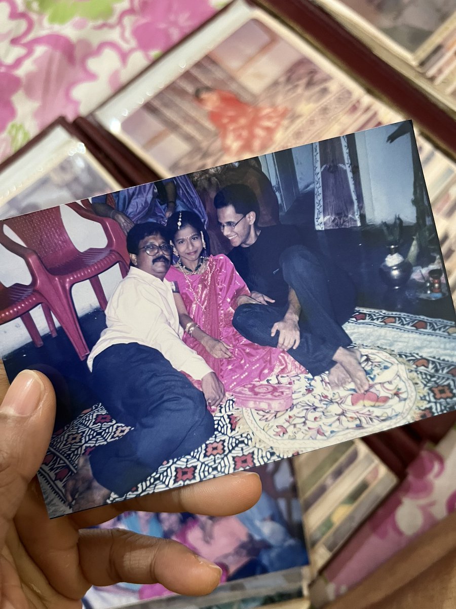 In Assam, when a girl has her first period, the whole family gathers to celebrate her transition into womanhood. This picture with my dad and brother was taken in 2002, marking my first period.