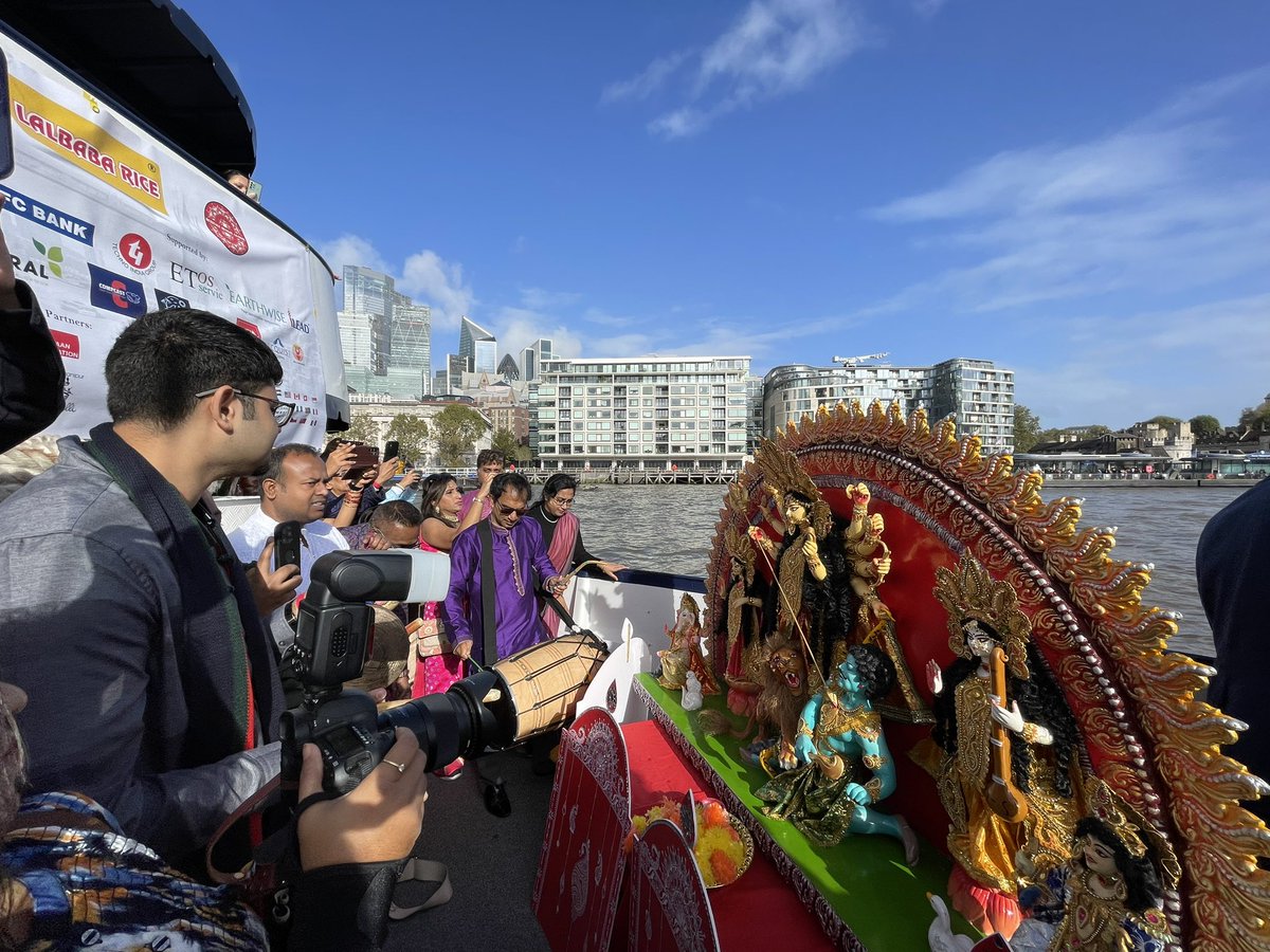 RupanjanaDutta's tweet photo. Thames Durga Parade organised by the Heritage Bengal Global today. 
You can see the Tower Bridge opening in the backdrop. https://t.co/4H4PhGbVNx