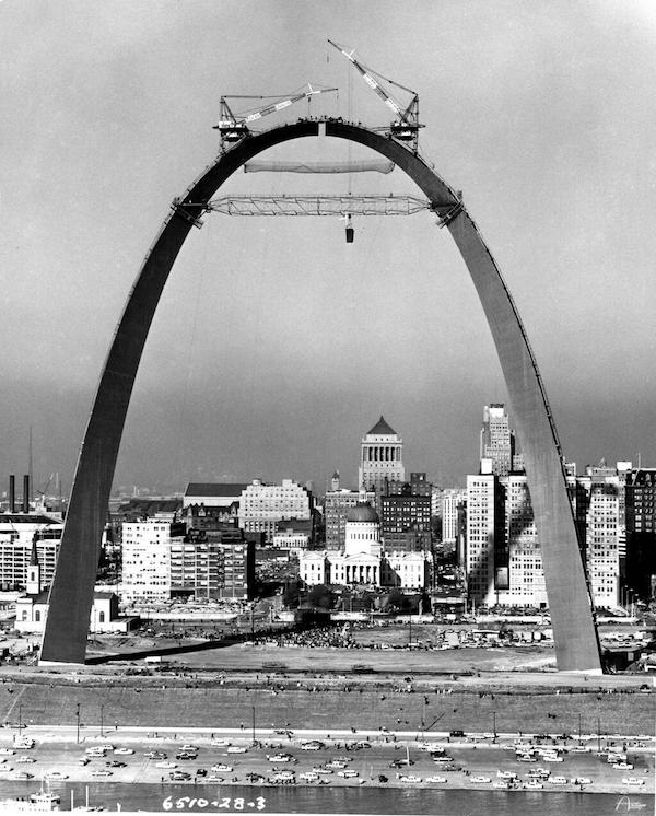 The placement of the final segment of the St. Louis Gateway Arch, 1965