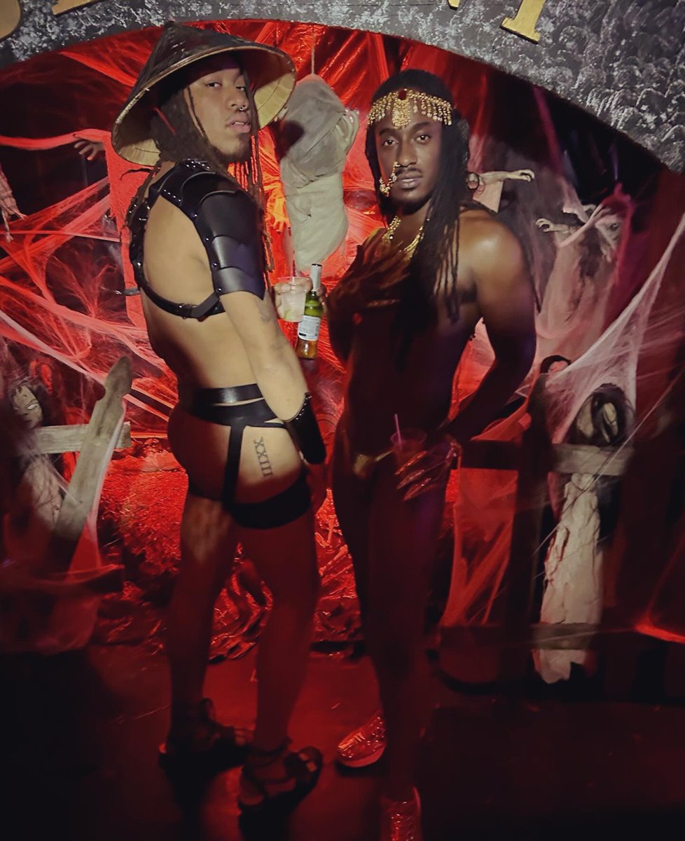 BlackModelesque's tweet photo. From two different worlds 🌏 🌍🖤💛 #deviant #trending #lgbtq #gay #ootd #halloween #genie #samurai #gaycouple https://t.co/BuLfTGdgll