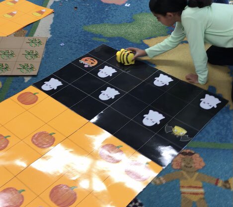 PCameronOCSB's tweet image. This Grade 2 student discovered that we can place two (or more) of our Halloween coding mats together to make one larger, more challenging, coding mat. 🎃👻🍫 Very clever, A! #ocsbCodes