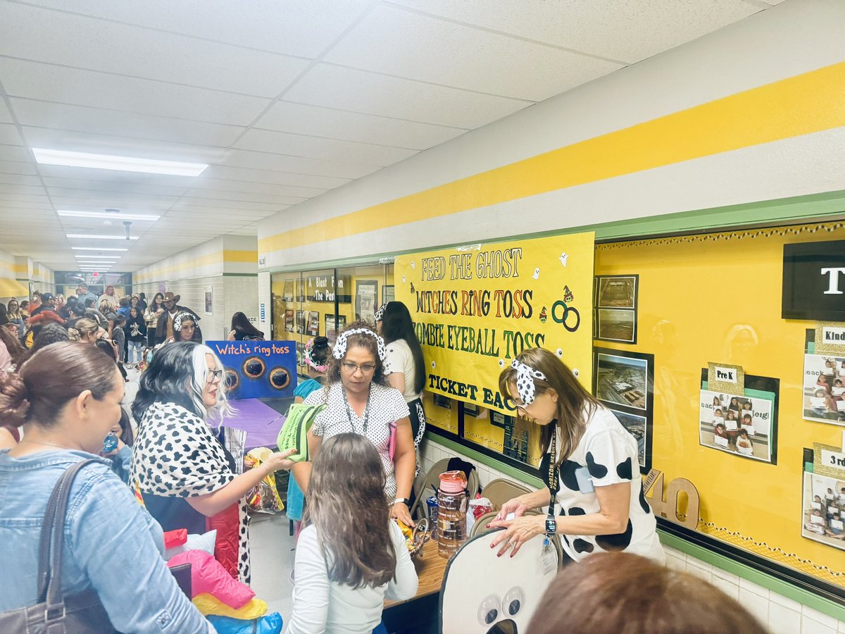 I spy with my little eye something yellow! 4th grade Minion Teachers! 💛 While 5th grade teachers marked their “Spots” during the Fall Festival! 🍂🐾 #FallFestival #OnlyAtTheHeights