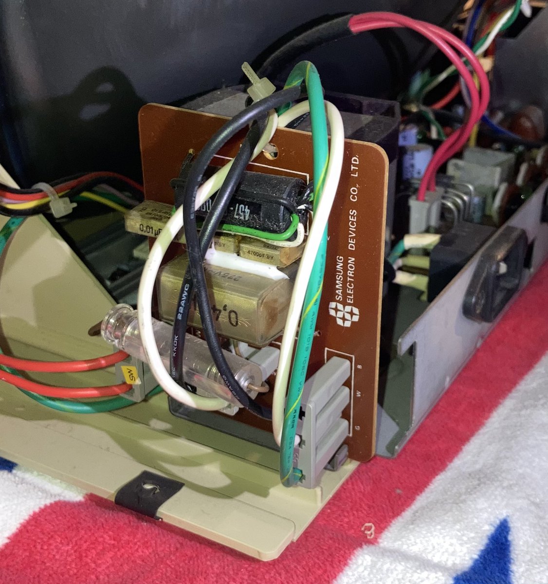 OzKfest's tweet photo. @a2_qkumba Throughout the day, participants continue to tinker and many things were worked on. There was extensive SMD capacitor replacement. Monitors were inspected. A Rev 0 was successfully tested. The clear case //e was completed. https://t.co/graN2o3UTf