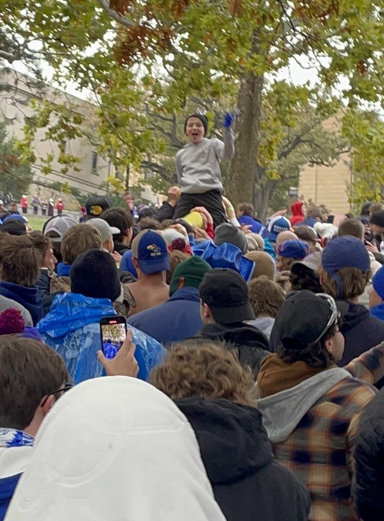 MaryCarp30's tweet photo. When your son runs off to celebrate @KU_Football beating @OU_Football and he turns up on top of the goalpost on its way to Potter Lake #momoftheyear @KUAthletics https://t.co/M02ghrwN0E