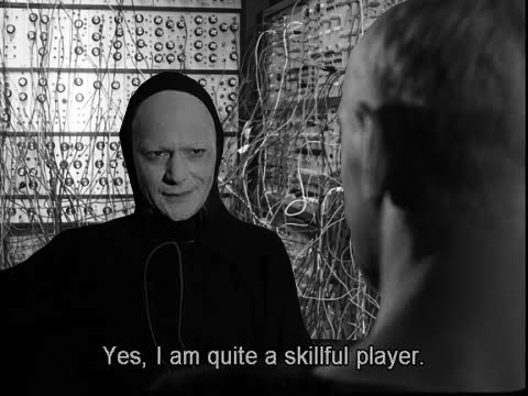 slime_golem's tweet photo. Forgot why I made this photoshop of Death from "The Seventh Seal" standing in front of a huge modular synthesizer https://t.co/dbeVJfNkBu