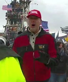 retiredtrnman's tweet photo. The #FBI has ID'd many who incited violence at the U.S. Capitol on January 6, but it still needs your help to bring others to justice. If the person in this photo looks familiar, submit a tip at https://t.co/LRUnRA40bG or 1-800-CALL-FBI, and mention photo #293-AFO.  #DemVoice1 https://t.co/527p2c01el