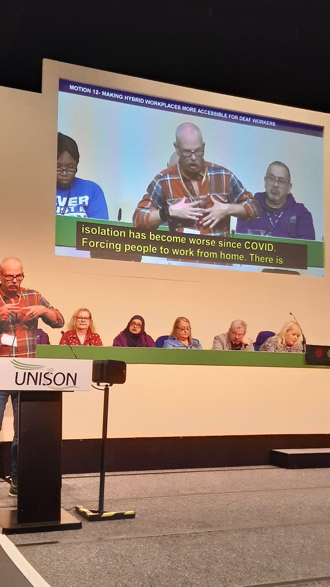 UNISONdm's tweet photo. Neil Ridley from the Deaf Caucus explains the communication  barriers and isolation facing Deaf workers when they are forced to work from home or attend online meetings. #UDMC23 @unisontheunion https://t.co/F2yQ9pVrW1