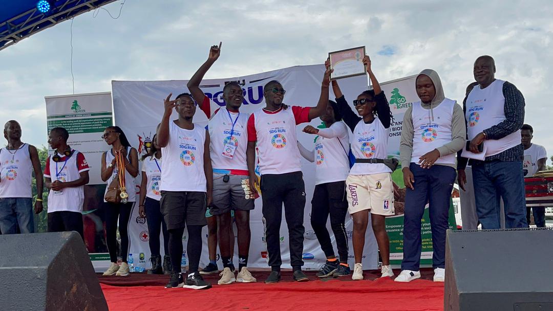 JothamWest's tweet photo. This morning I and my colleagues from @UCUniversit  @youthgogreen we joined the rest of ugandan at kololo ceremonial Grounds for the #5thSDGRun  .#Run4EnergyAccess @nbstv 
@dtb_uganda @UCC_Official @WWFUganda https://t.co/WYf8TPChBO