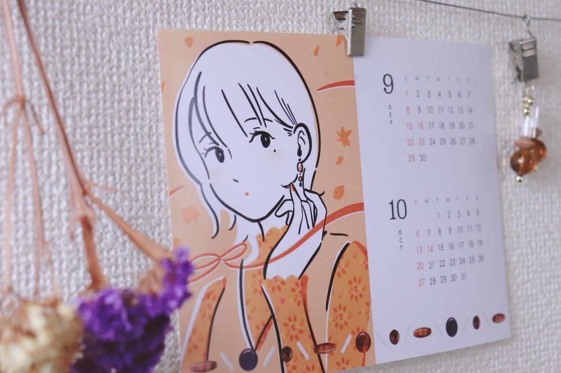 メイングッズはsaki ando選りすぐりのビーズで作ったピアス(写真はその一部です!)と、共同制作の2024カレンダー📸 