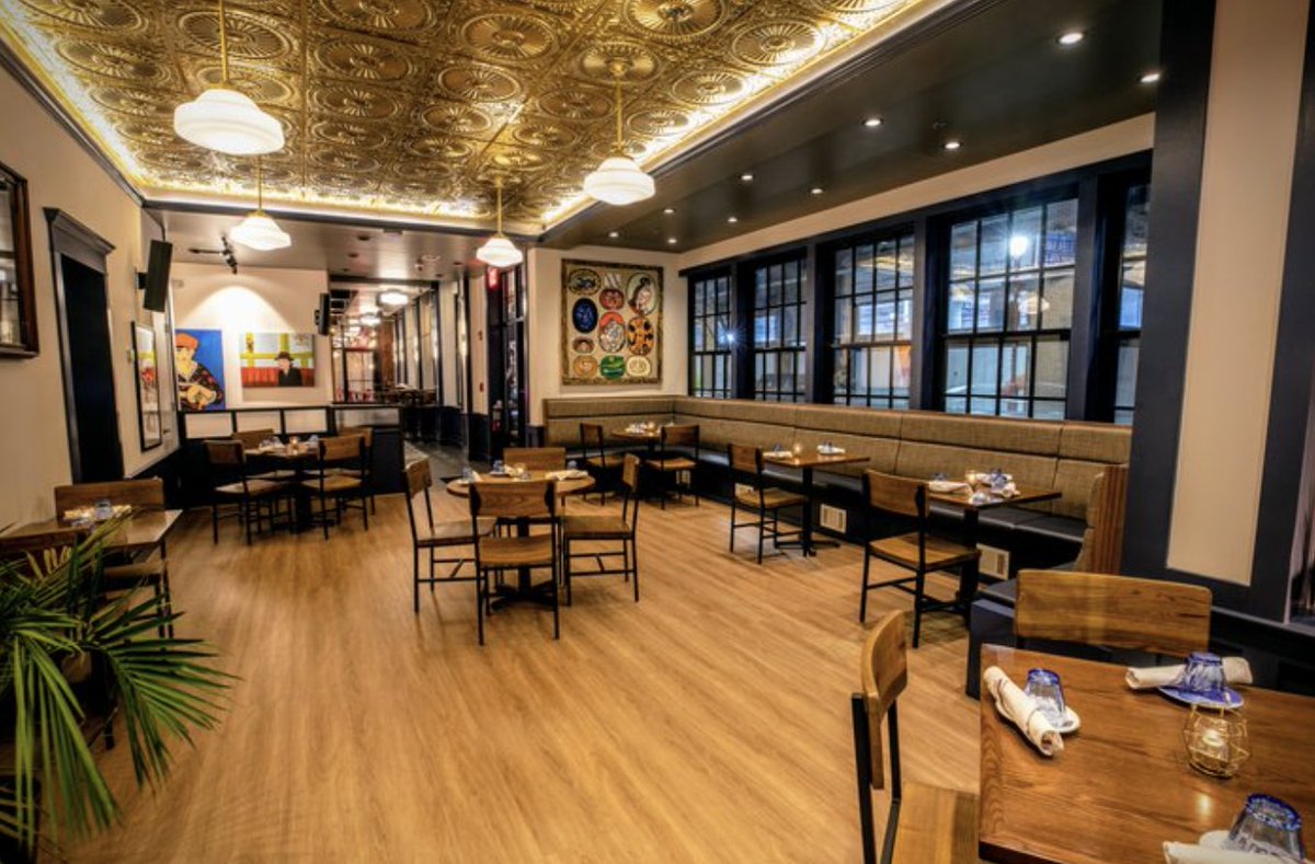 Cobylefko's tweet photo. Designed by Ambit Architecture (thanks @buckthundaz  for pointing me in their direction!) and redeveloped by the Foy family (who runs the bar & restaurant, Bridget Foy's), it is the sort of building that forms the fabric of great neighborhoods, of which Society Hill certainly is.

Though it doesn't scream out for attention, its solid core design, subtle detailing, like pitched roof, dormers, and chimney stacks, pull our eyes upwards, maximizing a rather small lot. With a few apartments above the bar, there will always be eyes on the street, and a mixing of different types of people.