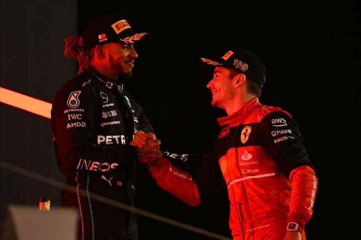 Leclercvettel1's tweet photo. Disqualified together last week but on the podium together this week!❤🤝💜 https://t.co/4ljmVR2W60