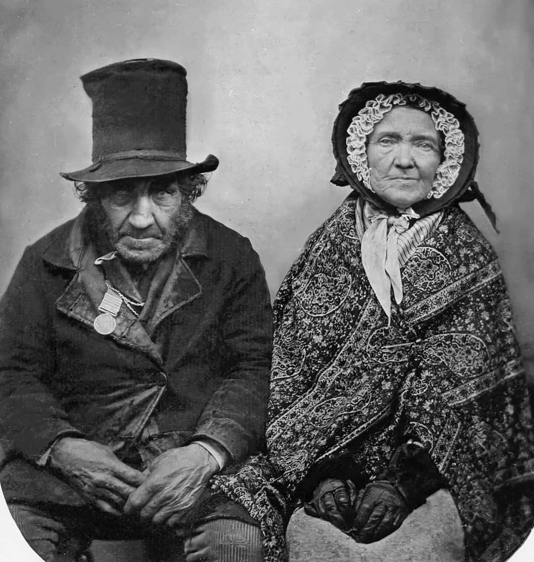 This is a photo of a British veteran of the Napoleonic wars posing with his wife. He can be seen wearing a campaign medal, commemorating the fact that he served in Spain.

This photograph was taken in 1850, 35 years after the Battle of Waterloo. It is hard to know how old the