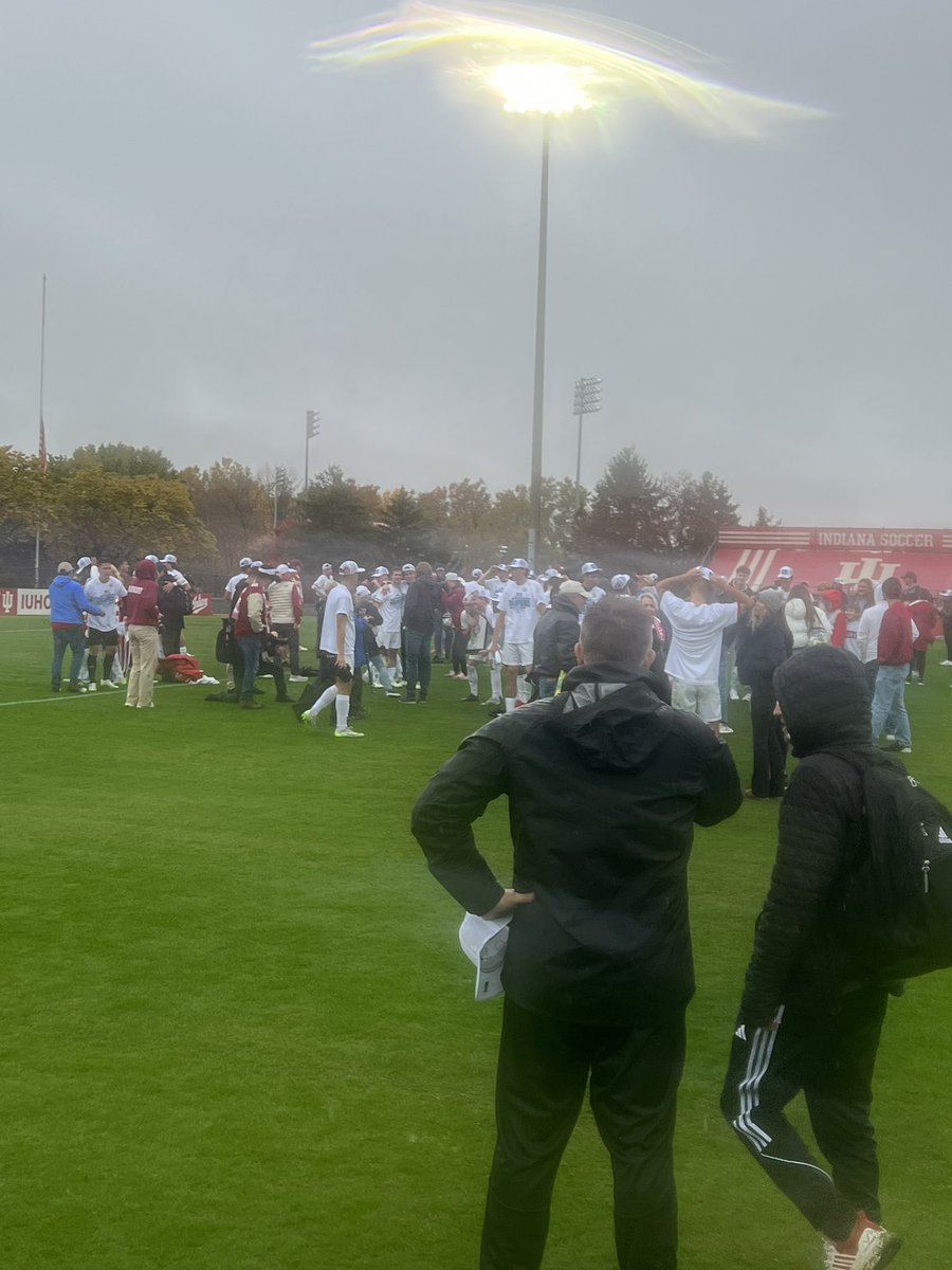 Like a proud father. Todd Yeagley, who’s son, Grant is on the team, watches on as his team celebrates the championship with their families. #iums 

<a href="/IUSTVsports/">IUSTV Sports</a>