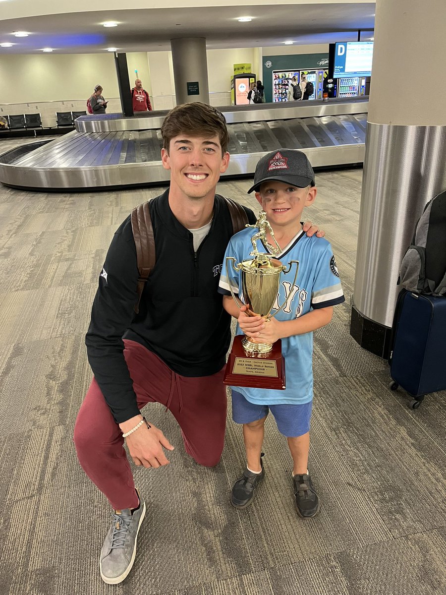Our batboy Arthur trying to recruit Cincinnati Reds lefty @therealBwill to join the Grays with the new 🏆. We wish Brandon Williamson future success with the <a href="/Reds/">Cincinnati Reds</a> - we will have a jersey waiting for you in 2033. Good luck!