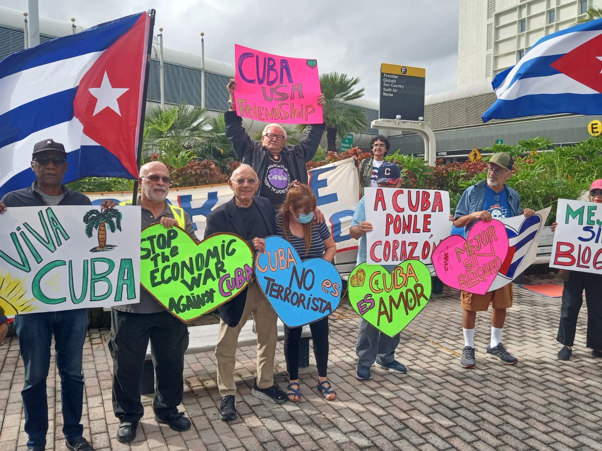 carantosan's tweet photo. Cubans living in #Florida, members of social movements and #US friends of #Cuba demanded today at the #Miami airport the lifting of the blockade and the removal of Cuba from the #SSOT list. #NoMoreBlockade #CubaIsNotAlone https://t.co/j4BA7QUgSa