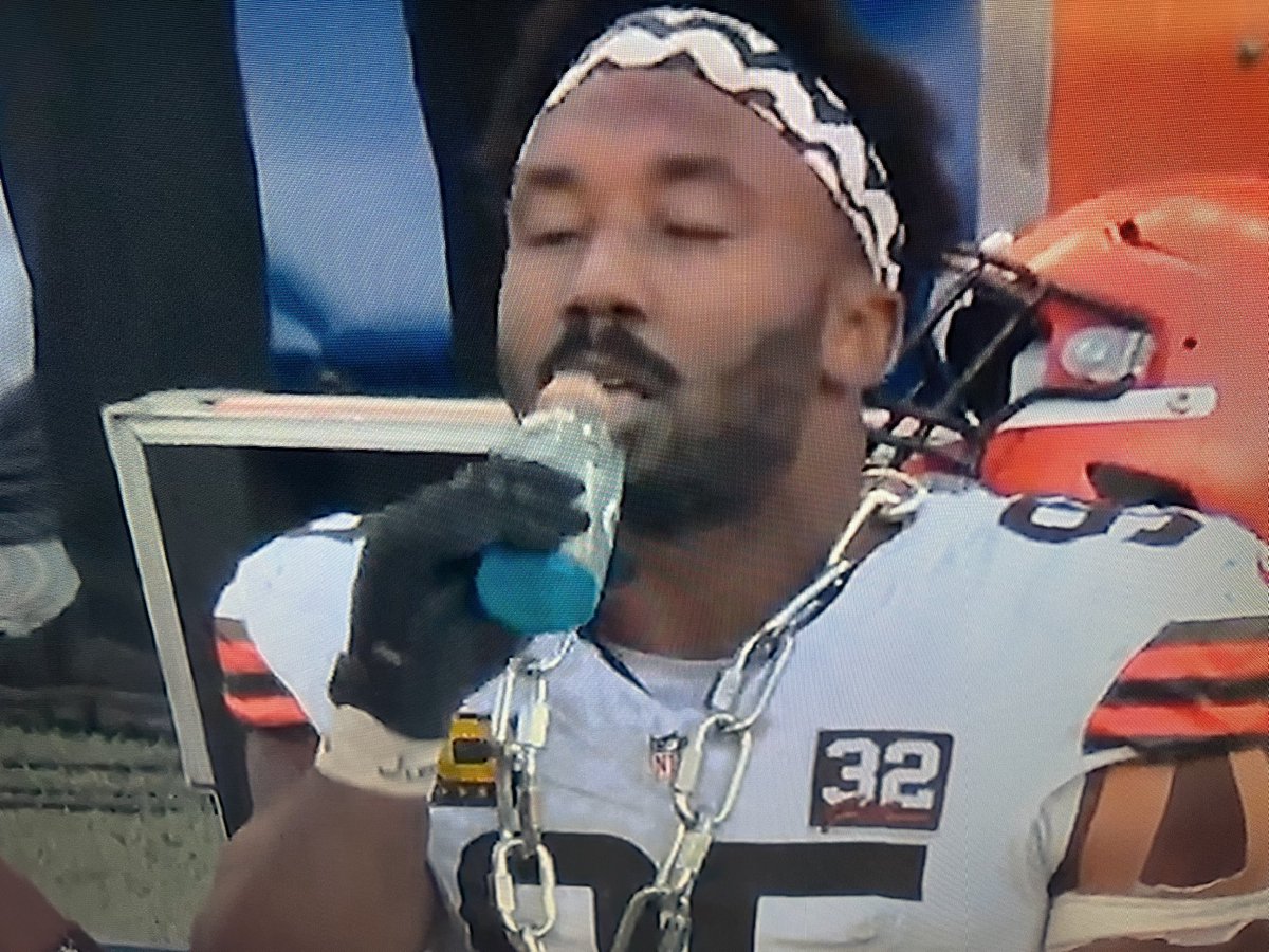 MMAStatCat's tweet image. Myles Garrett drinking from a regular size Gatorade bottle