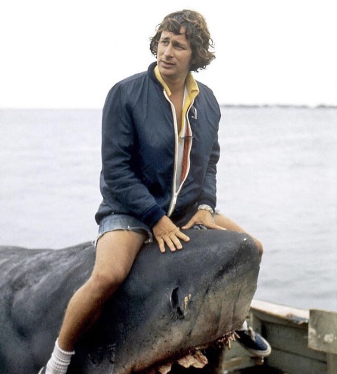 historyinmemes's tweet image. Steven Spielberg on the set of Jaws in 1974. Over 67 million people in the U.S watched the film when it was first released in 1975, making it the first summer blockbuster.

Spielberg on photo 1 to Entertainment Weekly: 

“[Laughs.] Now let me tell you about the picture - that's a…