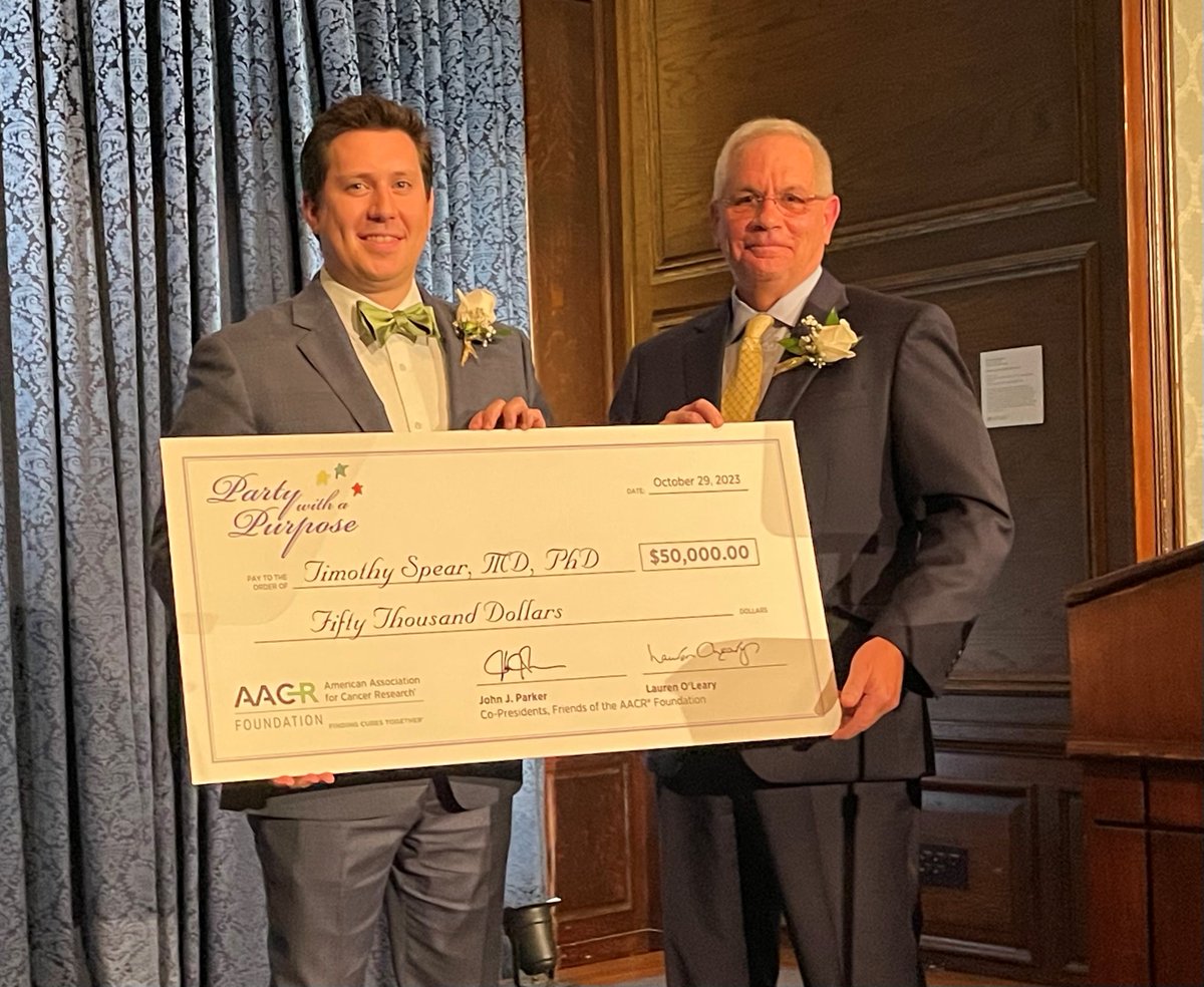 AACRFoundation's tweet photo. Party with a Purpose Scientific Achievement Awardee John M. Maris, MD, presented the Party with a Purpose Early-Career Investigator research grant to Timothy Spear, MD, PhD, a pediatric hematology/oncology fellow at @ChildrensPhila. https://t.co/62WqpWnOJA