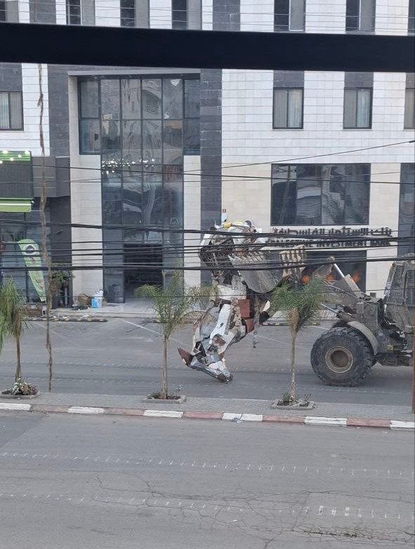 Hanine09's tweet image. The erasure of symbols of resistance is foundational to settler colonialism. 

Today, Jenin’s Horse landmark, was stolen by Israeli bulldozers. The Horse, constructed from the remnants of an ambulance bombed by the Israeli occupation in 2002, represented strength and courage.
