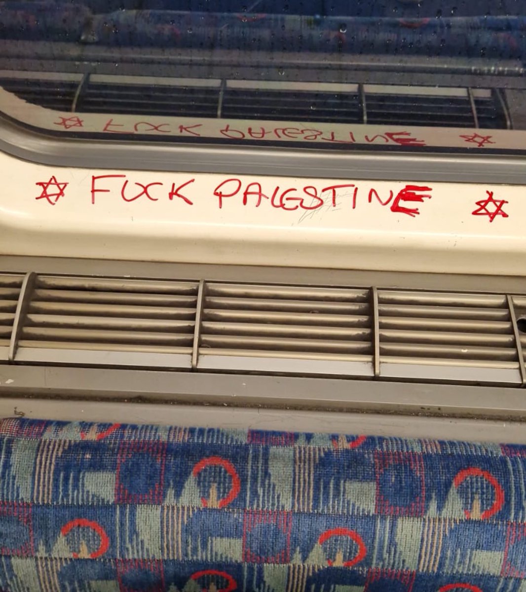 If we see racist graffiti like this on our tube trains, we take them out of service. We won't drive your hatred round London