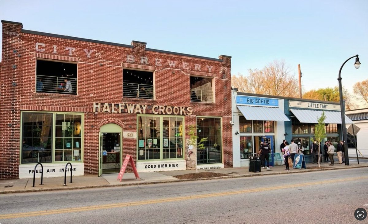 Similar size, similar cost.

Creating the building on the left takes a ton of effort and money.

The building on the right (one of our projects) also took a ton of effort and money.

The one on the left makes everything around it less desirable, but the one on the right helped