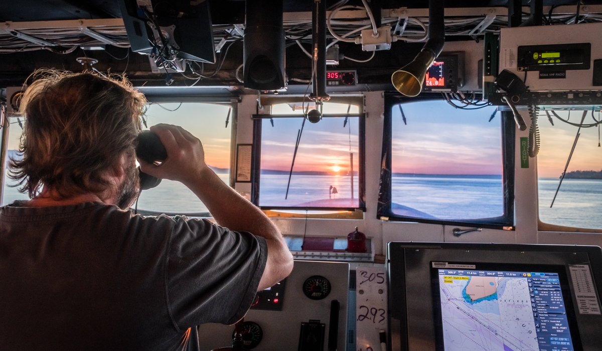 Looking forward to the weekend! 👀 In this photo, a lookout on #NOAA Ship Fairweather observes the waters of #pugetsound, WA during a #sunset. #photofriday #NOAA #navigation