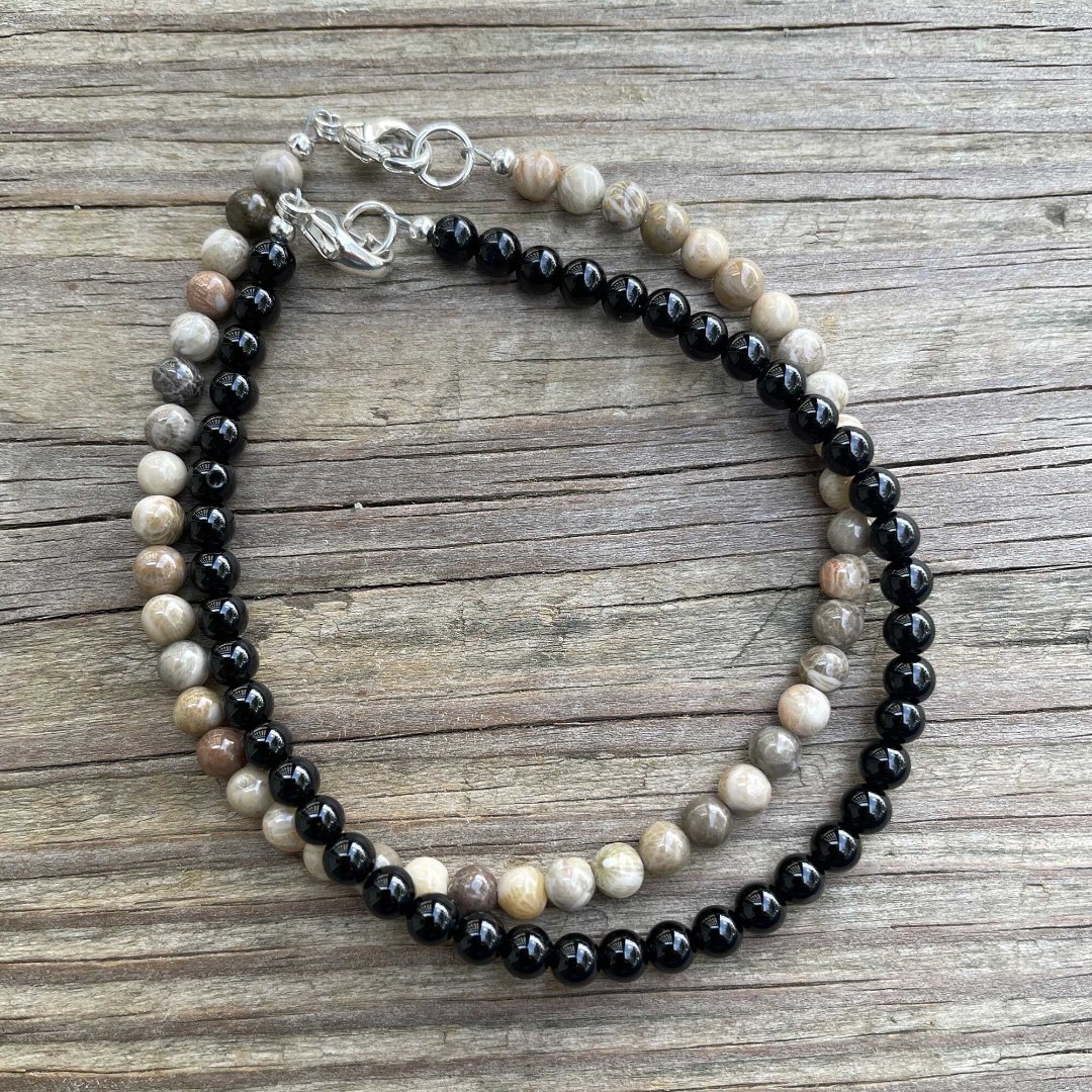 Black Onyx & Petoskey Coral bracelet stack, a perfect combo for Fall! Available in my shop.  #bracelets #onyxjewelry #giftideas #madeintexas #jewelry #gemstonejewelry #fallfashion