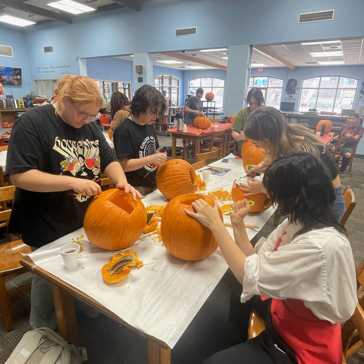 MHS librarians Mr. Tidwell and Ms. Braun invited students to carve pumpkins in the library after school. It's feeling like fall! #wearemaryville