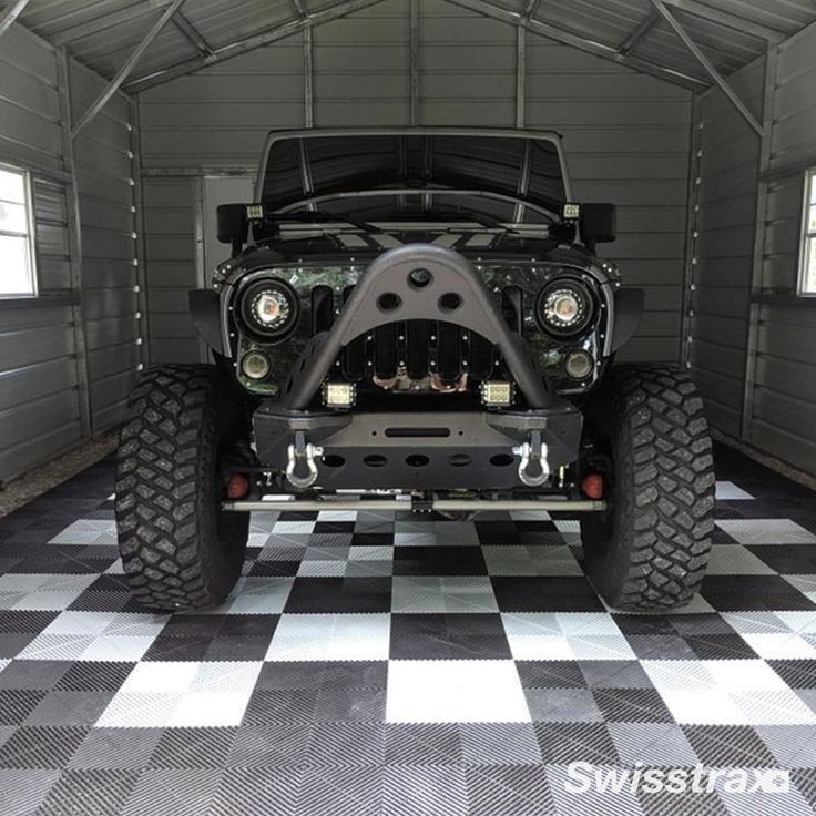 Designed to handle a compressive strength of 2.5k PSI, Swisstrax tiles are built to last.

Discover the unrivaled performance of Swisstrax → bit.ly/3yXXBOw

#Garage #ModularFlooring #GarageMakeover #Durability #Jeep