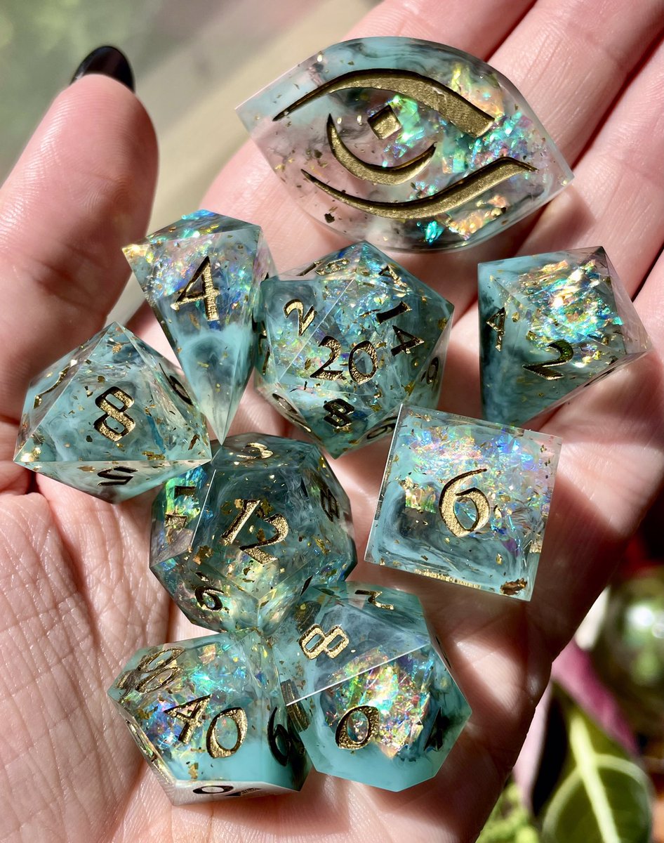 Want these handcrafted #dice? 👀

Excited to announce a #GIVEAWAY 🎉

Enter to win this #handmade set!

Swirling teal, a touch of black smoke, gold flake, and opal shards 💫

To enter:  
- Follow my TTRPG account <a href="/swordofsoulsRPG/">SWORD OF SOULS</a> 
- Like &amp; retweet this post

Winner chosen 11/4 ⚔️