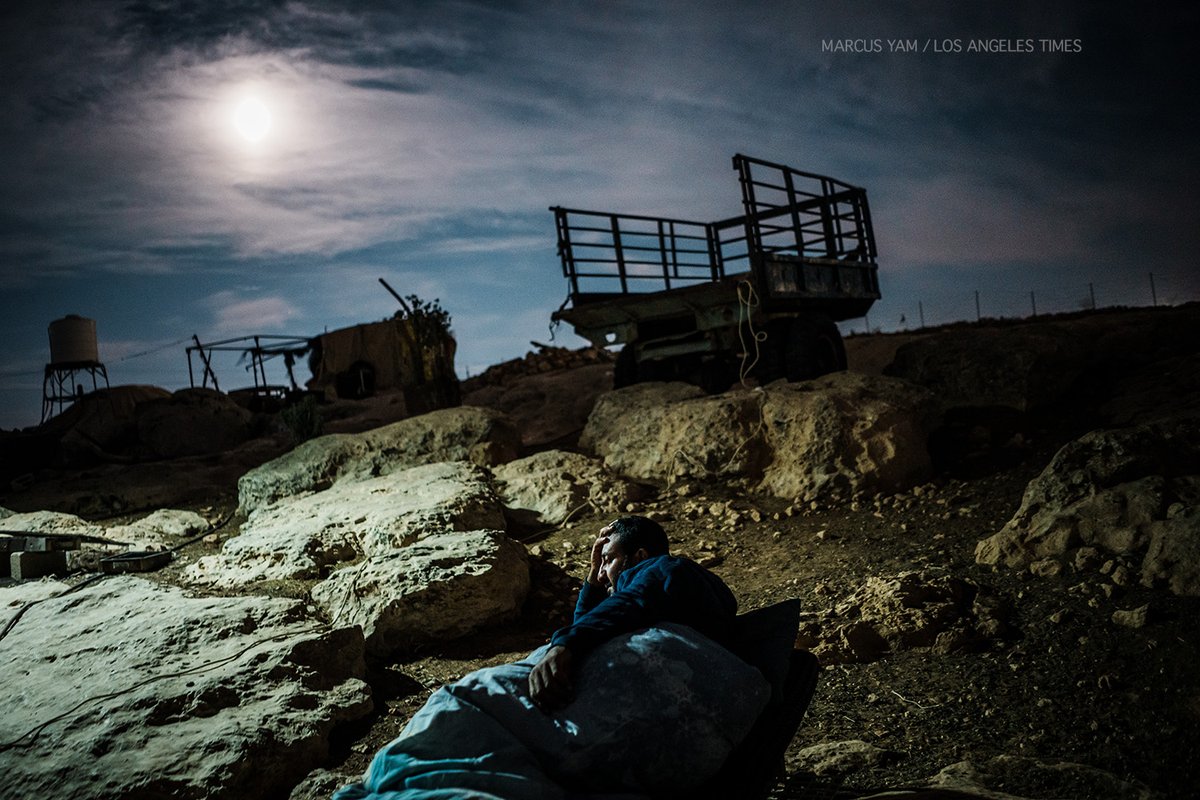 A low rumble of fighter jets in the night sky. Palestinians on the edges of the occupied West Bank sleep under a waning gibbous moon. They take turns to watch for Israeli settlers who might show up in the middle of the night. They fear displacement. They fear for their lives.