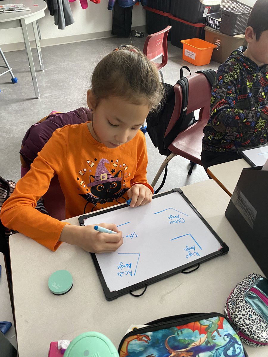 misslysack's tweet photo. It was a busy morning in Grade 4! We learned about different kinds of angles, attended a Walk Safely presentation, and finished up our pumpkin for the pumpkin raffle 🎃 https://t.co/rxDVmNSi6X