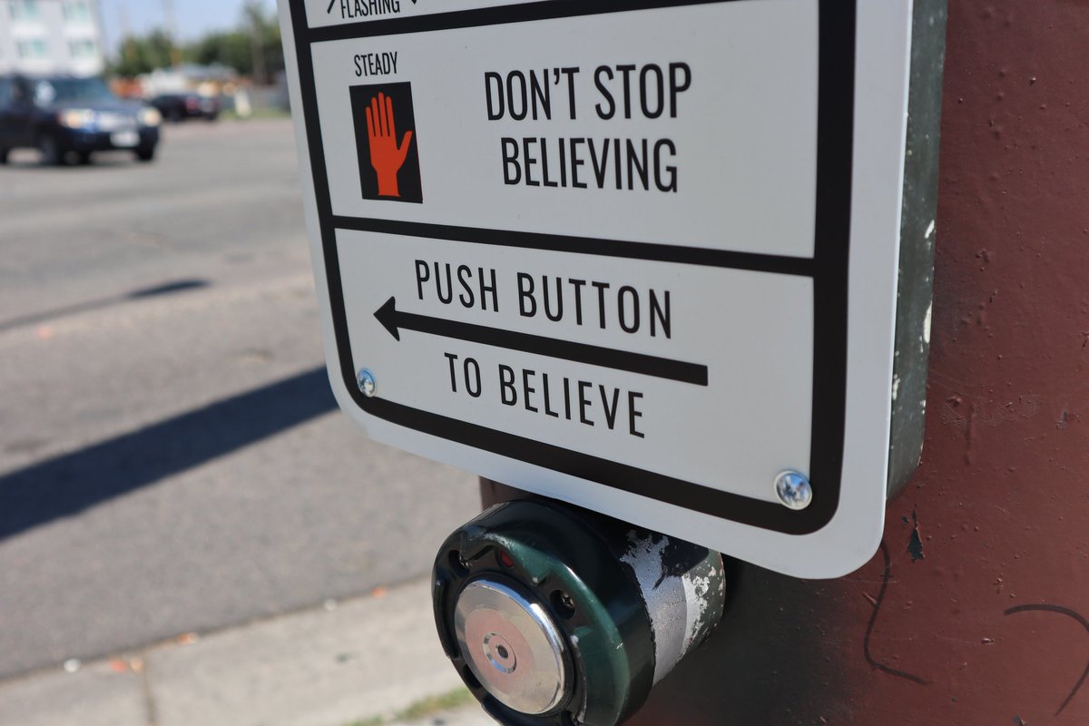 "Don't Stop Believing" is my new installation on Colfax &amp; Sheridan. Vinyl stickers on painted steel (reclaimed scrap from a filing cabinet). The sign has been up for ten weeks now with only mild vandalism